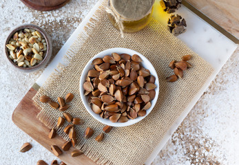 Beechnuts and beech nut oil. Healthy organic food concept, vegetarianism. Top view