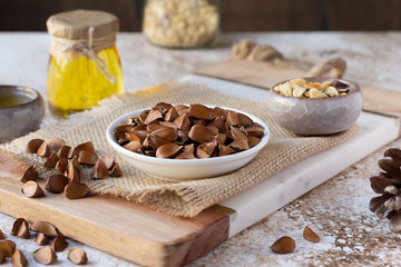 Beechnuts and beech nut oil. Healthy organic food concept, vegetarianism