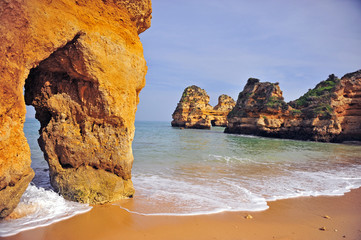 Naklejka premium Amazing natural arch at Praiado Camilo, Portugal