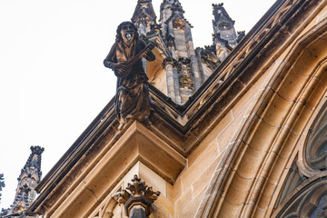 Prague, Prague / Czech Republic: August 22, 2009: Large-scale details of the gargoyles on the facade of the San Vito Cathedral. In 2009 the facade was much cleaner than today, and gargoyles look great
