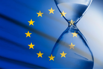 Composite image of the EU flag and hourglass - obrazy, fototapety, plakaty