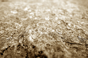 Marble stone background with blur effect in brown tone.