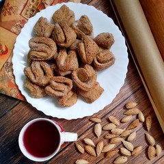 Beautiful layout Delicious cookies, Cup of compote and almonds scattered around