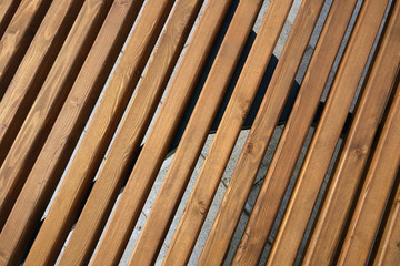 Background of wooden strips on the bench surface