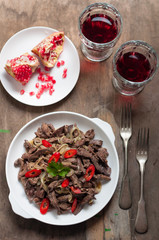 Fried Beef Liver with Onion and Chili Pepper. Turkish Appetizer Ciger Kavurma
