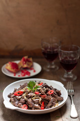 Fried Beef Liver with Onion and Chili Pepper. Turkish Appetizer Ciger Kavurma
