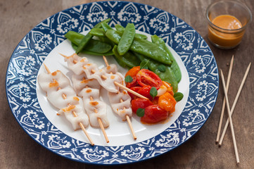 Grilled Squid Skewers with Sauteed Tomatoes and Snow Peas