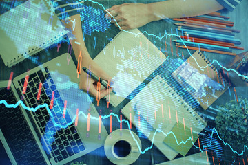 Financial chart drawn over hands taking notes background. Concept of research. Double exposure