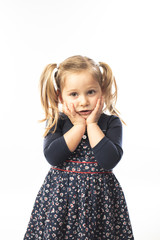 portrait of a pensive blond little girl