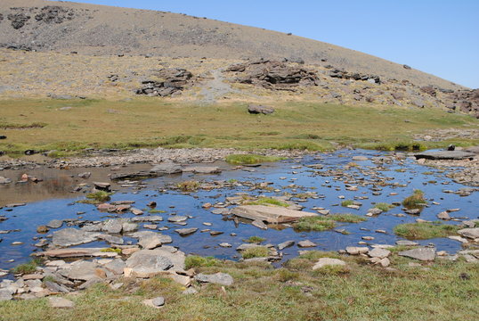 Landscape with a lake in Siete Lagunas, Sierra Nevada, Granada, Spian.
