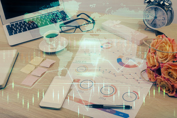 Multi exposure of graph and financial info and work space with computer background. Concept of...