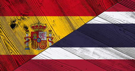 Flag of Thailand and Spain on wooden boards