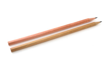 Brown pencil on white background