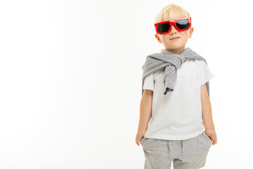 Fashionable little caucasian boy, picture isolated on white background