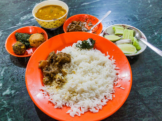 Meal in Bangladesh - Rice, Alo vorta, dhal, Shim borta and chicken curry