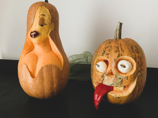 Yellow Pumpkin carved Jessica Rabbit looking with naughty friend.