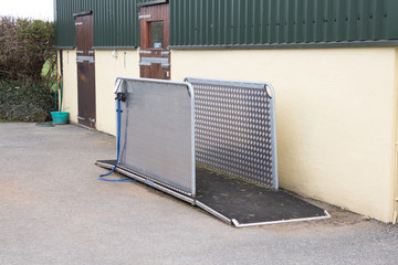 Large metal weigh bridge used to weigh horses.