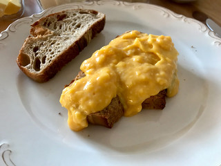 Scrambled Eggs with Bread Slice in Plate for Breakfast.