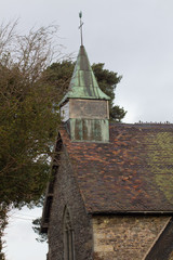 Fototapeta na wymiar Historical old church with lead lined steeple 