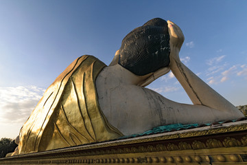 Giant reclining Buddha statue in Bago, Myanmar - close-up
