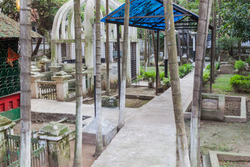 Fototapeta na wymiar Small cemetery in Old Dhaka, Bangladesh