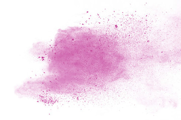 Pink powder explosion on white background. Paint Holi.