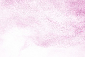 Pink powder explosion on white background. Paint Holi.
