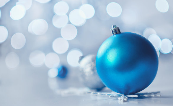 christmas balls and decoration on the blue background