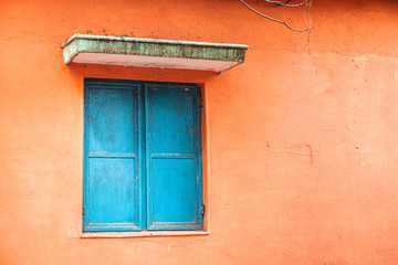 blue window on the pink wall with space
