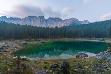 Sunrise landscapes in Lago di Carezza and Latemar Mountain in the background in Welschnofen, South Tyrol, Italy