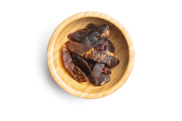 Beef jerky pieces. Dried beef meat.
