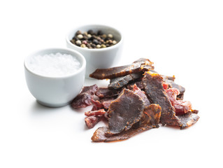 Beef jerky pieces. Dried beef meat.