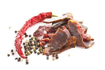 Beef jerky pieces. Dried beef meat.