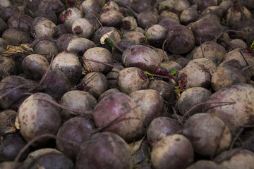 Fresh purple beets as a background