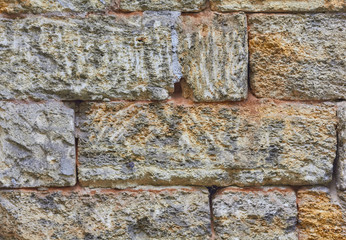 Obraz premium wall of yellow shell rock, texture of the old wall