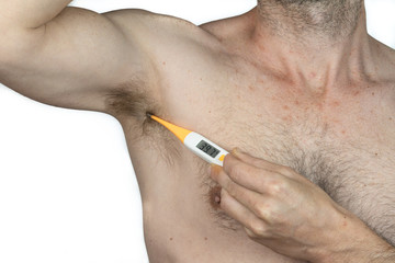 caucasian man without a shirt taking his temperature with a thermometer, isolated on White background