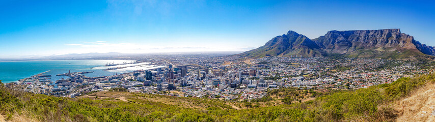 Panoramic view over Cape Town, Devil's Peak and Table Mountain from Signal Hill on a sunny day, South Africa
