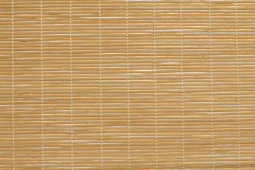 Wall made of brown natural material. bamboo straw