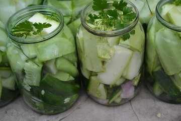 Tasty and healthy. Pepper. Homemade food. Natural products. Preservation. Marinated Cucumbers and zucchini