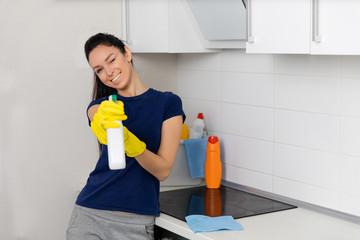 Close up photo cheerful beautiful busy duties she her lady indoors pulverize cleaning supplies...