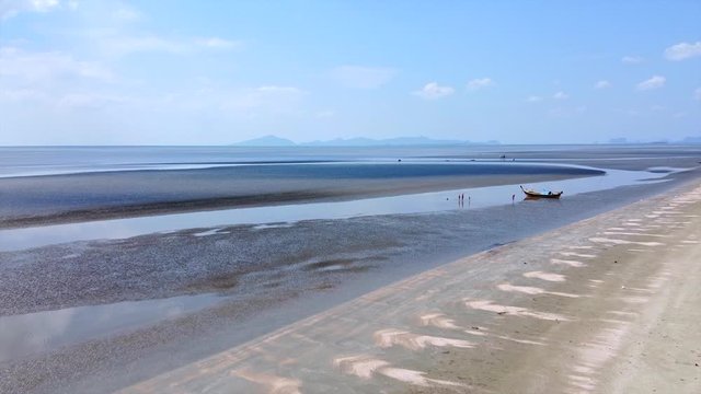 Aerial Shot Revolving boat on the beach from Thailand