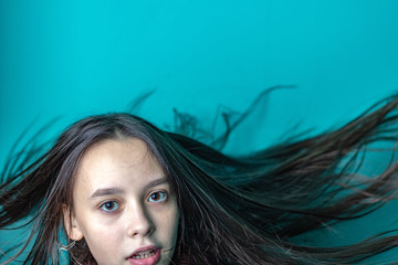 Fototapeta premium Studio photo of a young girl, distant look
