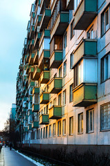A view of the standard wall of a municipal houe in the sleeping district of the city