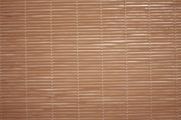 Obraz premium Bamboo brown straw mat as abstract texture background composition.