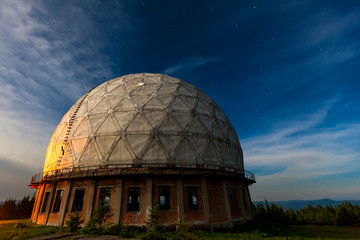 Radar station geosphere on the starry sky background