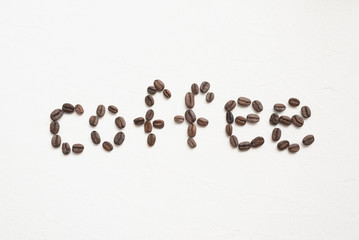 Coffee the inscription isolated on white background.