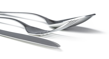 Spoon, knife and fork isolated on white background