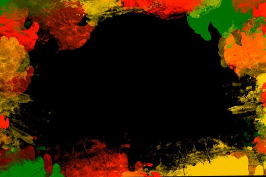 Green yellow red leaf on copy space background ,reggae background