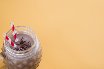 Chocolate smoothie  on fluor color background
