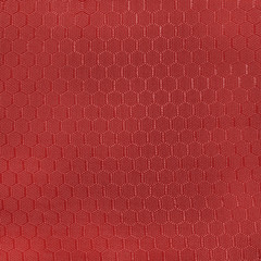 Fabric with geometric pattern in the form of honeycomb.Texture or background